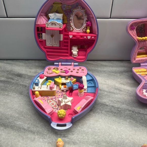 Polly pocket vintage toys. Two in set. Comes with 2 dolls and one unicorn